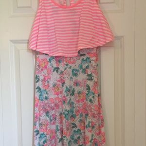 50% OFF! (Price shown is adjusted price). 2 girls size 14 dresses.